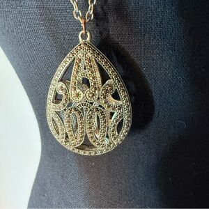 Silver Toned Necklace Teardrop Birdcage Pendant Reddish Hue Rhinestones Filagree